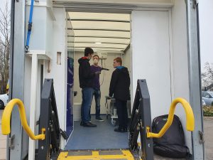 People viewing the inside of an AccessoLoo